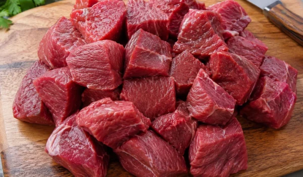 Raw halal boneless beef cubes for curry cooking